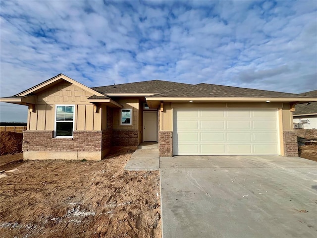 view of front of property with a garage