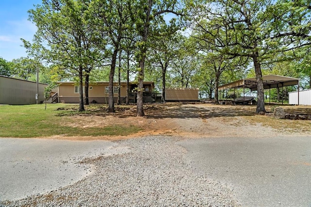 view of front facade featuring a carport