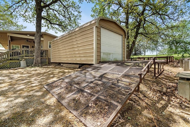 exterior space featuring ceiling fan