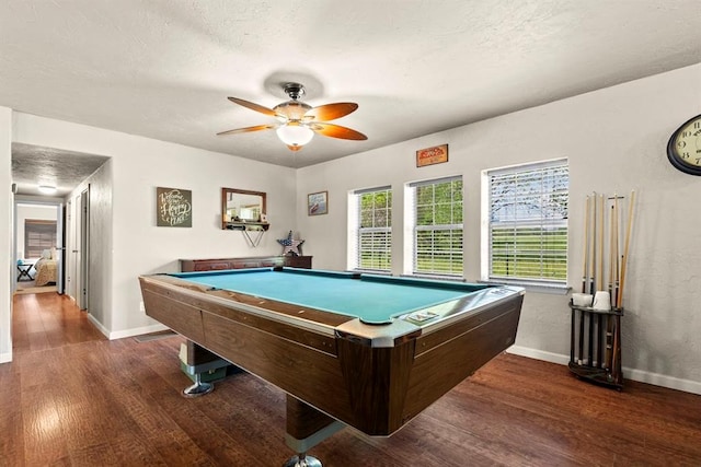 playroom featuring ceiling fan, dark wood-type flooring, a textured ceiling, and billiards