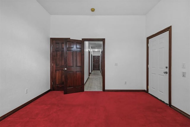 unfurnished bedroom with light carpet