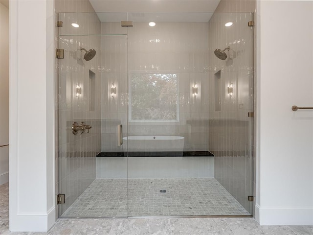 bathroom featuring an enclosed shower