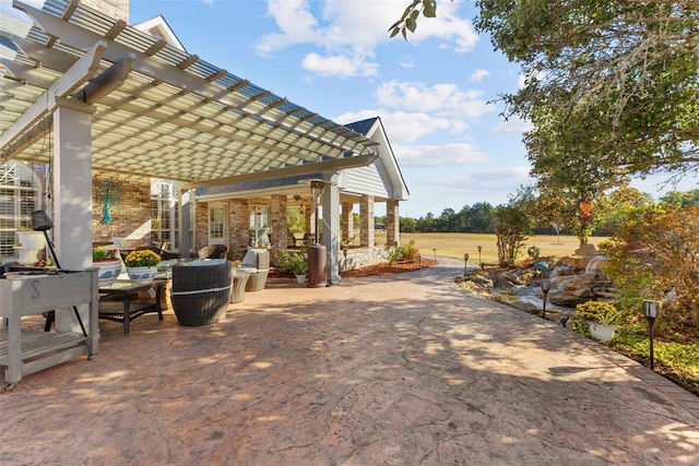 view of patio / terrace featuring a pergola