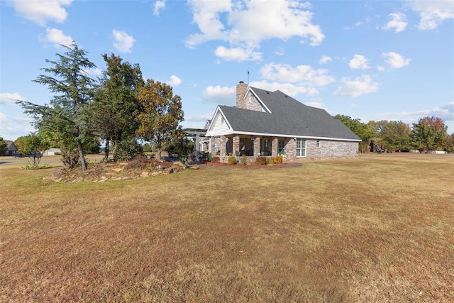 view of home's exterior featuring a lawn