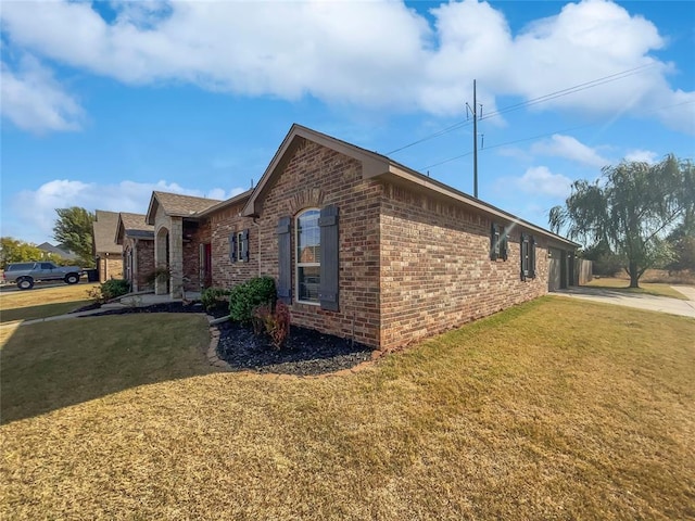 view of property exterior featuring a lawn