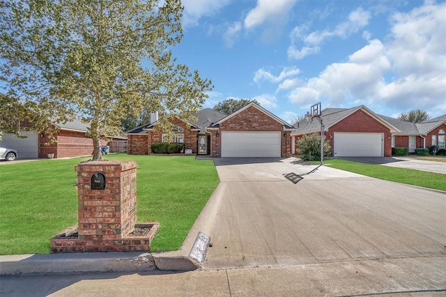 single story home featuring a front lawn and a garage