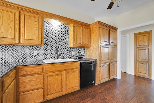 516 S Quail Run, Altus, OK 73521 - kitchen featuring black dishwasher, dark countertops, ceiling fan, decorative backsplash, and lofted ceiling