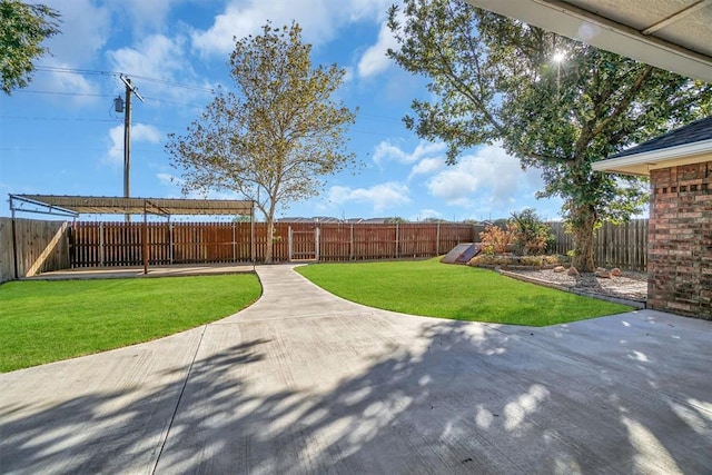 516 S Quail Run, Altus, OK 73521 - fenced backyard featuring a patio