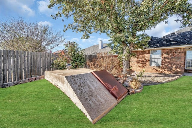 entry to storm shelter with a yard