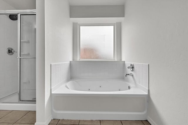 bathroom featuring separate shower and tub and tile patterned flooring