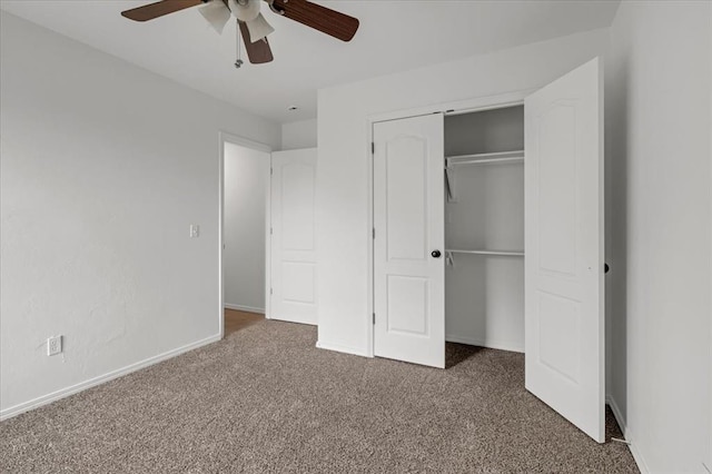 unfurnished bedroom featuring ceiling fan, a closet, and dark colored carpet