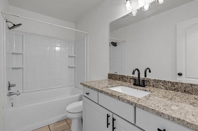 full bathroom with toilet, tile patterned floors, shower / tub combination, and vanity