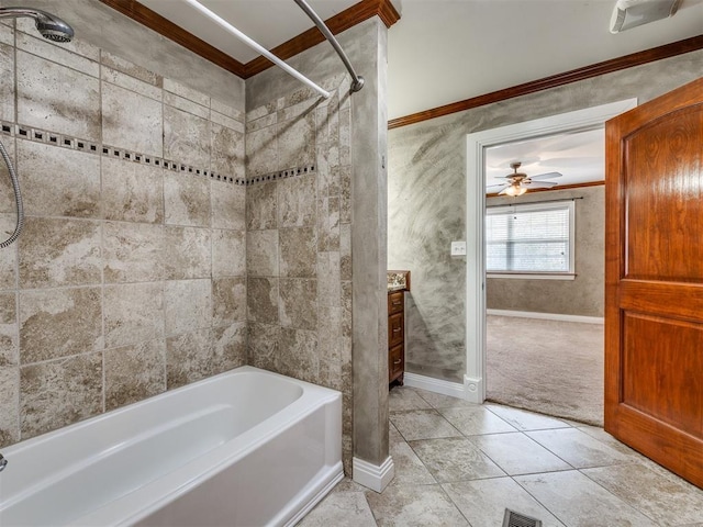 bathroom featuring tiled shower / bath, tile patterned floors, ceiling fan, and ornamental molding