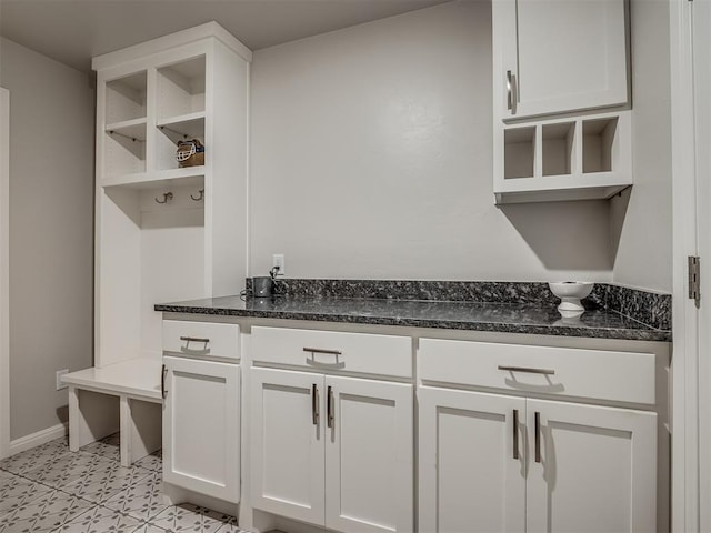 interior space with tile patterned floors