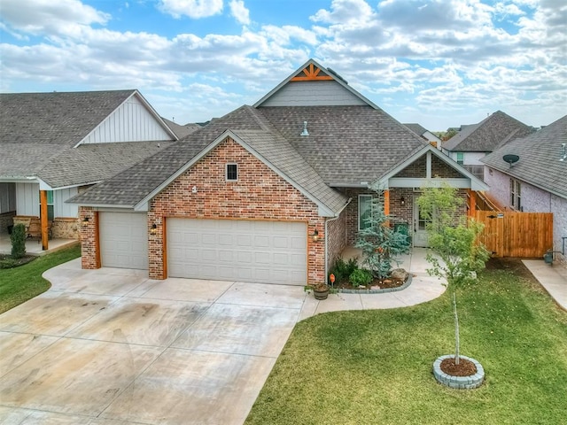 view of front of property featuring a front lawn and a garage