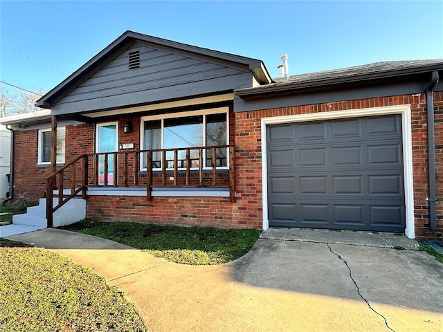 ranch-style home with brick siding, a porch, an attached garage, and driveway