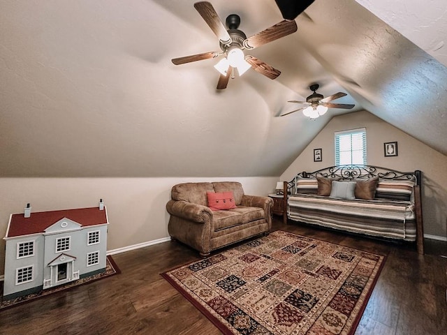 bedroom with lofted ceiling, ceiling fan, and dark hardwood / wood-style floors