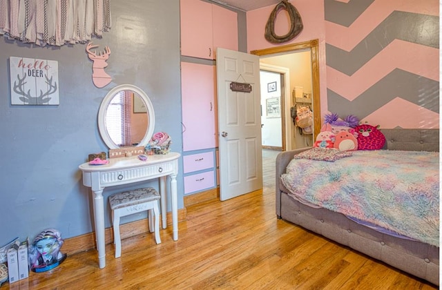 bedroom featuring light hardwood / wood-style floors