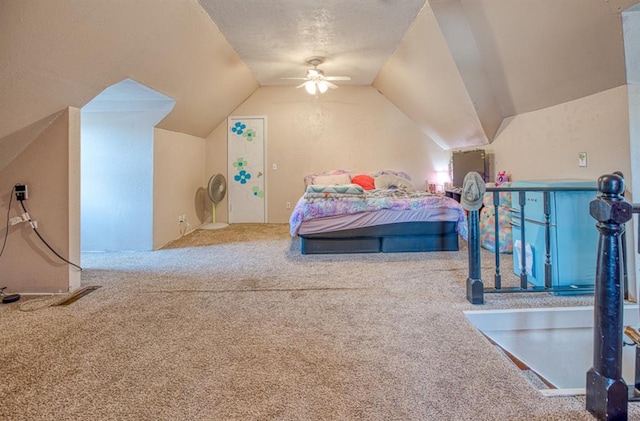 carpeted bedroom featuring vaulted ceiling and ceiling fan