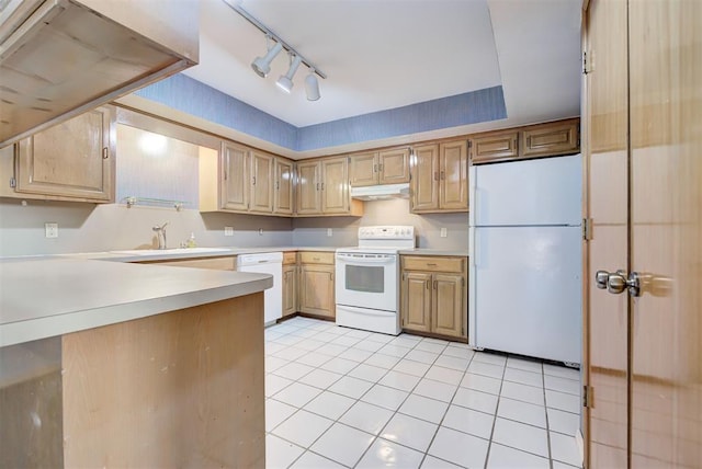 kitchen featuring light tile patterned flooring, white appliances, sink, and track lighting