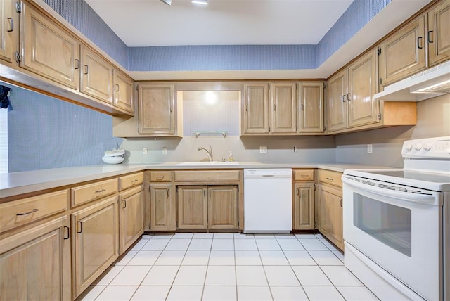 kitchen with sink, white appliances, and ventilation hood