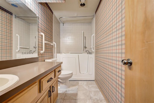 full bathroom with tile patterned flooring, vanity, toilet, and shower / bath combination