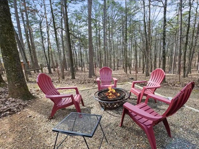 view of patio with an outdoor fire pit