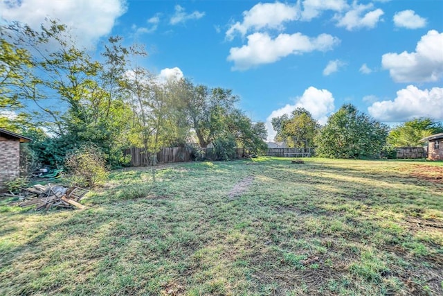 view of yard with fence