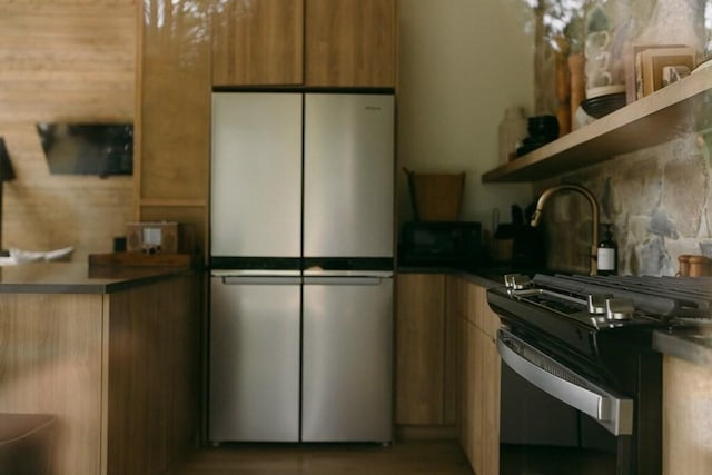 kitchen with stainless steel fridge