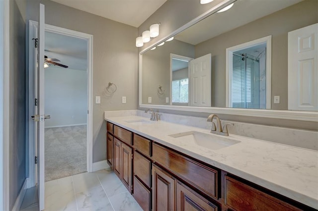 bathroom with vanity and ceiling fan