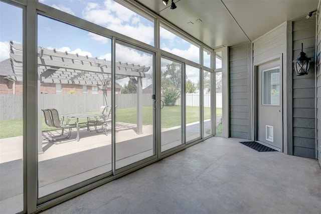 doorway to outside with concrete floors