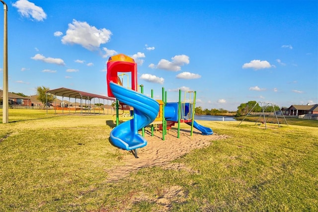 communal playground featuring a lawn