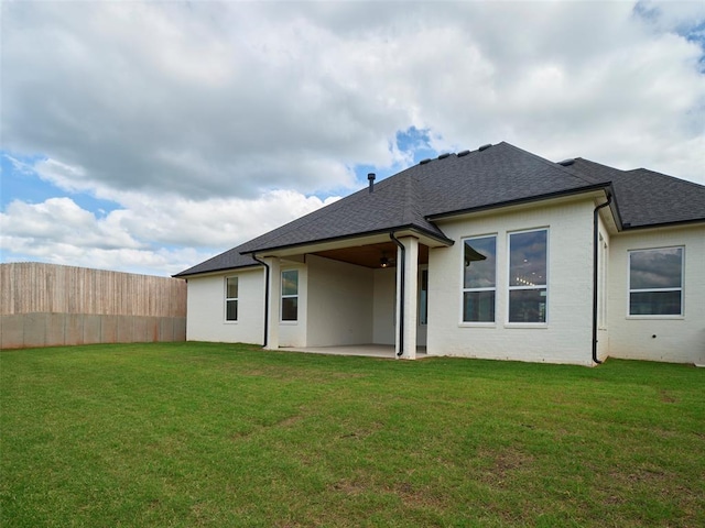 511 Basin Way, Norman, OK 73071 - back of house with a patio and roof with shingles