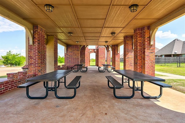 view of patio / terrace featuring fence