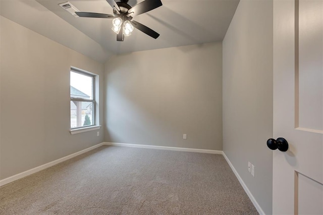 unfurnished room with baseboards, carpet floors, a ceiling fan, and vaulted ceiling