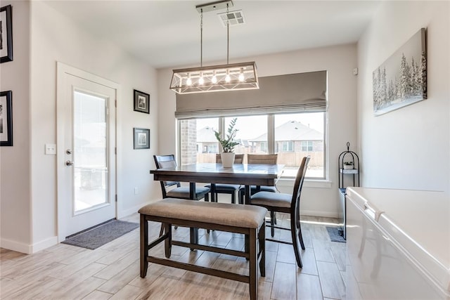 dining room featuring light hardwood / wood-style floors