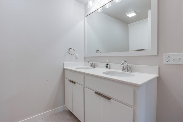 bathroom with vanity and tile patterned floors