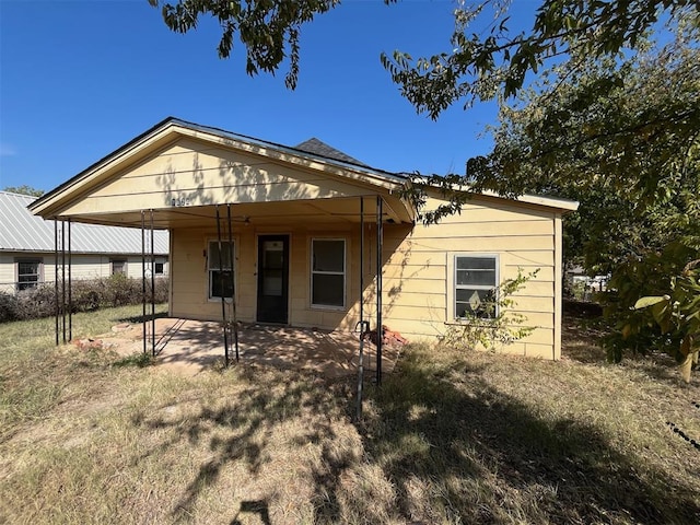 rear view of property with a patio