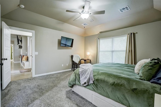 bedroom featuring carpet, vaulted ceiling, and ceiling fan