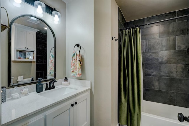 full bathroom with shower / tub combo with curtain, vanity, and toilet