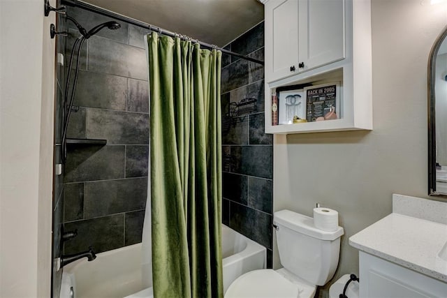 full bathroom featuring vanity, toilet, and shower / bath combo with shower curtain