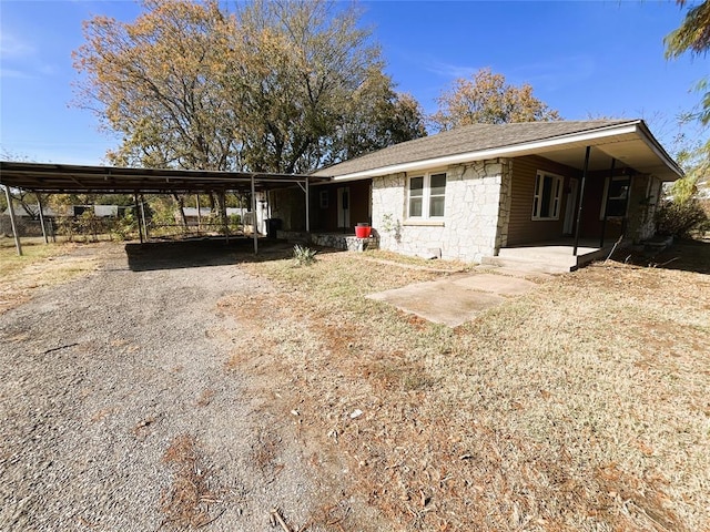 view of front facade featuring a carport