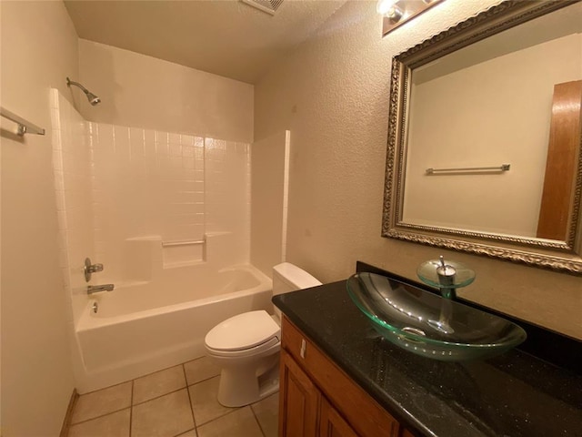 full bathroom with tile patterned floors, vanity,  shower combination, and toilet