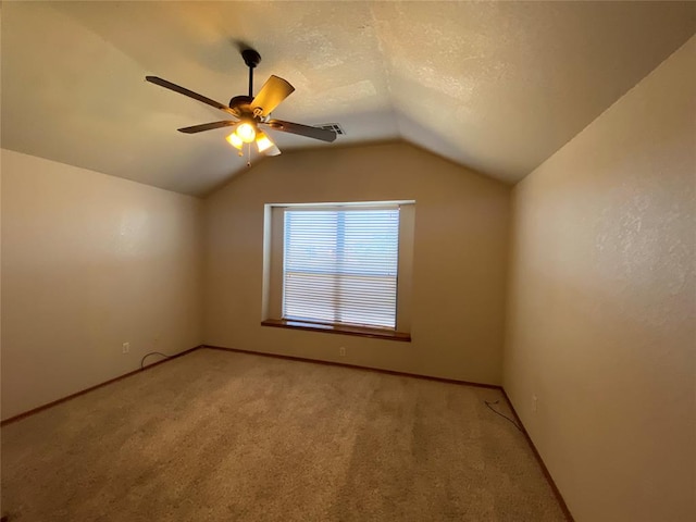 bonus room featuring light carpet, a textured ceiling, ceiling fan, and lofted ceiling