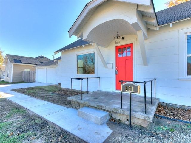 property entrance featuring a garage