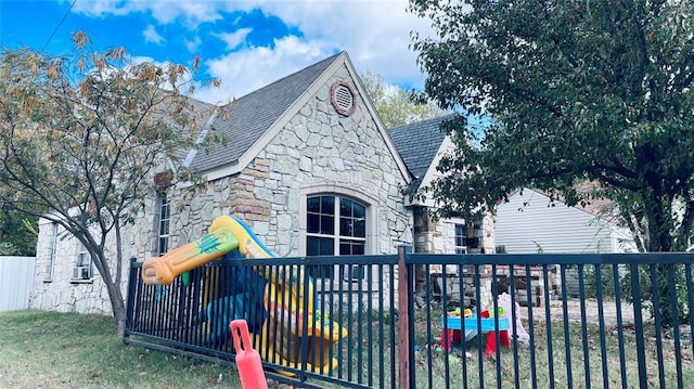 view of front of property featuring a playground