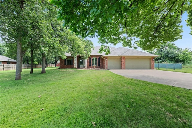 single story home featuring driveway, brick siding, an attached garage, and fence