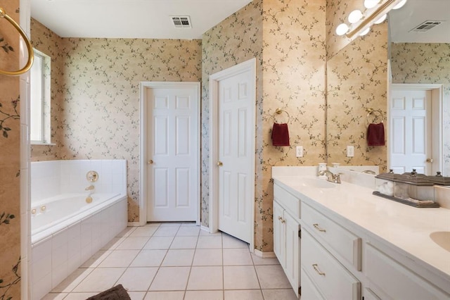 full bathroom with tile patterned flooring, a sink, visible vents, a bath, and wallpapered walls