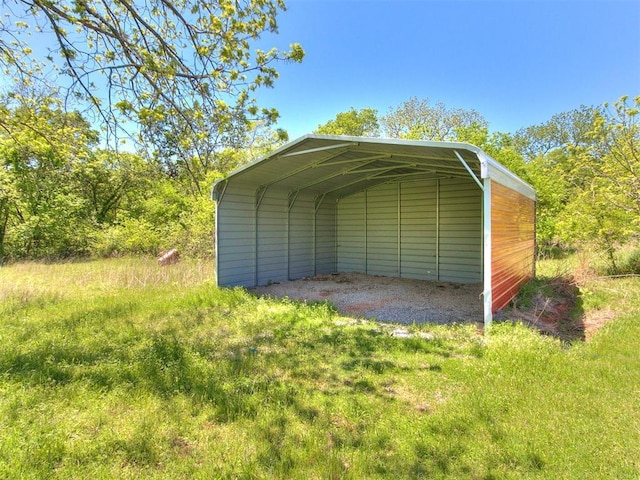 garage with a carport