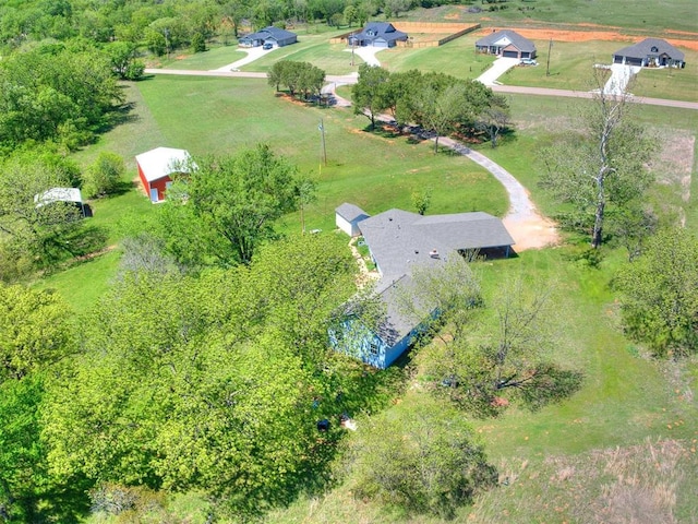 birds eye view of property featuring a rural view